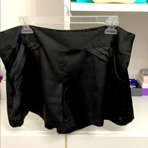 Dressy black satin looking shorts.